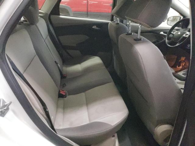 Foto 10 de la subasta – 2014 FORD FOCUS SE con VIN 1FADP3F23EL119714