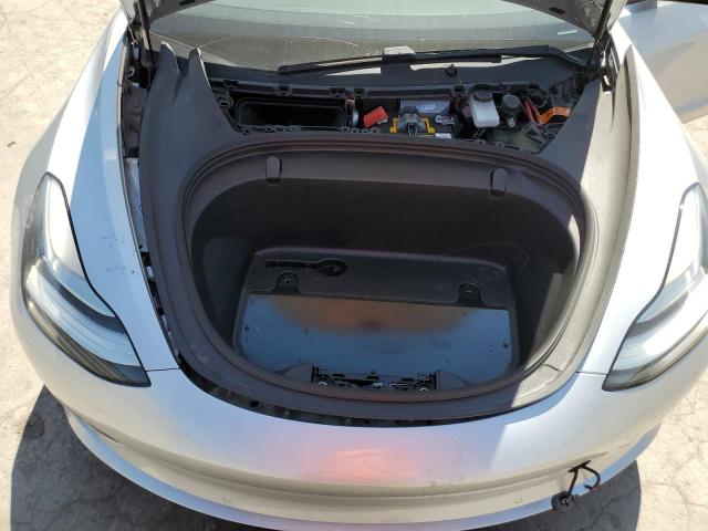 Photo 11 from auction – 2018 TESLA MODEL 3 with VIN 5YJ3E1EB0JF065058