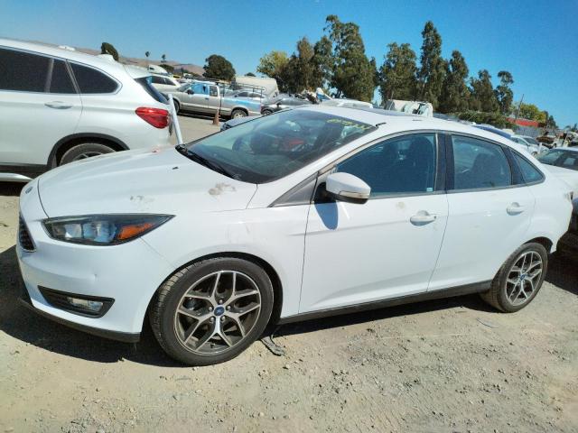 FORD FOCUS SEL 2018 with VIN 1FADP3H23JL304577 - Photo from auction