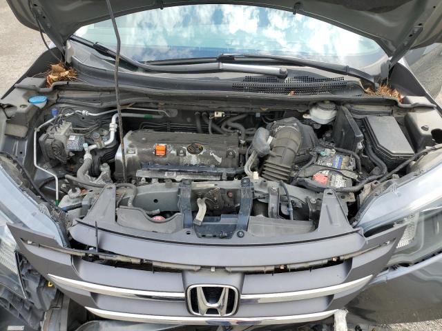 Photo 12 from auction – 2014 HONDA CR-V LX with VIN 2HKRM4H37EH681009