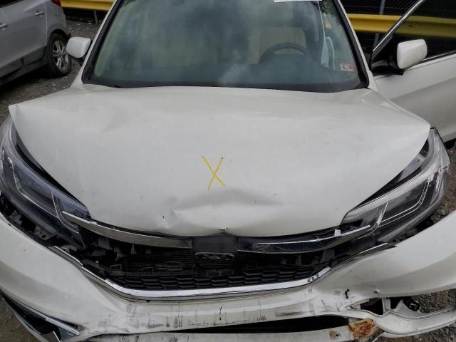 Photo 11 from auction – 2015 HONDA CR-V EX with VIN 5J6RM4H52FL008377