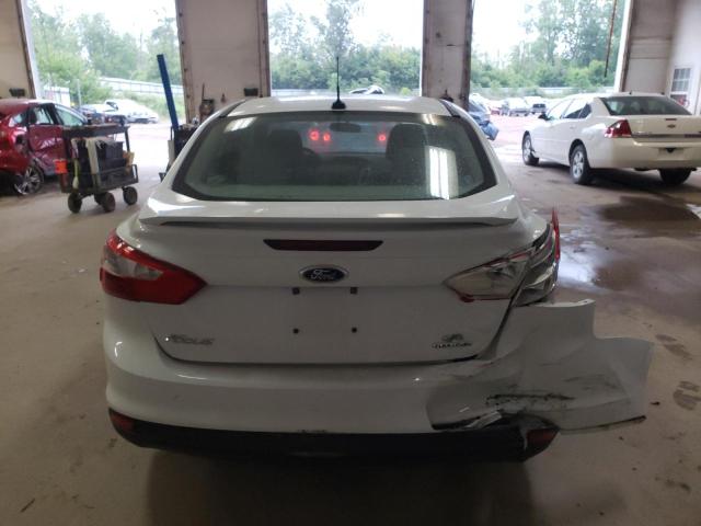 Foto 6 de la subasta – 2014 FORD FOCUS SE con VIN 1FADP3F23EL119714