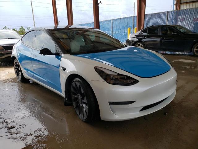 Photo 4 from auction – 2021 TESLA MODEL 3 with VIN 5YJ3E1EC3MF037025