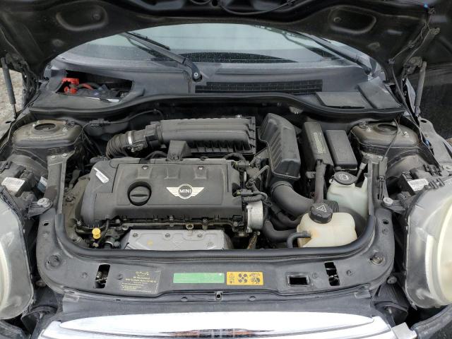 Снимка 11 от търг – 2009 MINI COOPER CLU с VIN WMWML33589TX35304