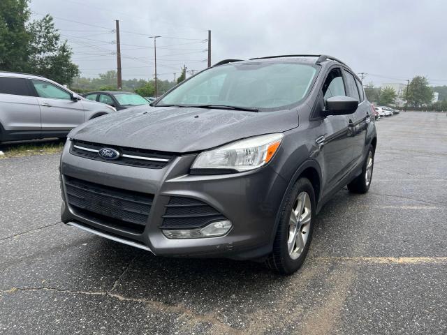 Photo 2 from auction – 2014 FORD ESCAPE SE with VIN 1FMCU9GX9EUA33857
