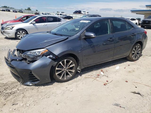 TOYOTA COROLLA L 2017 with VIN 5YFBURHE9HP627847 - Photo from auction