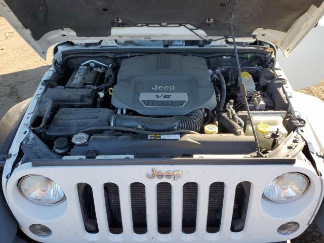 Photo 11 from auction – 2014 JEEP WRANGLER U with VIN 1C4BJWFG4EL234905