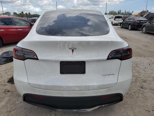 Foto 6 de la subasta – 2023 TESLA MODEL Y con VIN 7SAYGDEE2PA116063