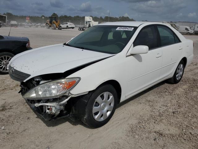 TOYOTA CAMRY LE 2004 with VIN 4T1BE32K74U301319 - Photo from auction