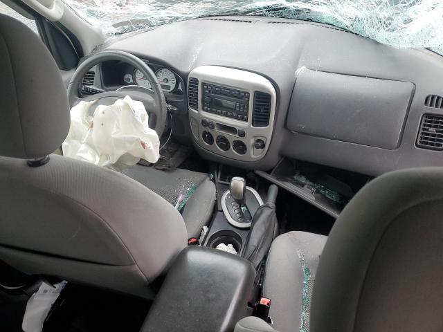Photo 8 from auction – 2005 FORD ESCAPE XLT with VIN 1FMYU93145KD38928