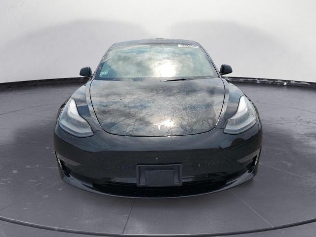 Photo 5 from auction – 2022 TESLA MODEL 3 with VIN 5YJ3E1EB9NF189173
