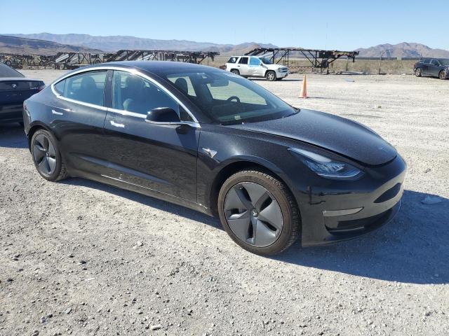 Снимка 4 от търг – 2018 TESLA MODEL 3 с VIN 5YJ3E1EA6JF070143