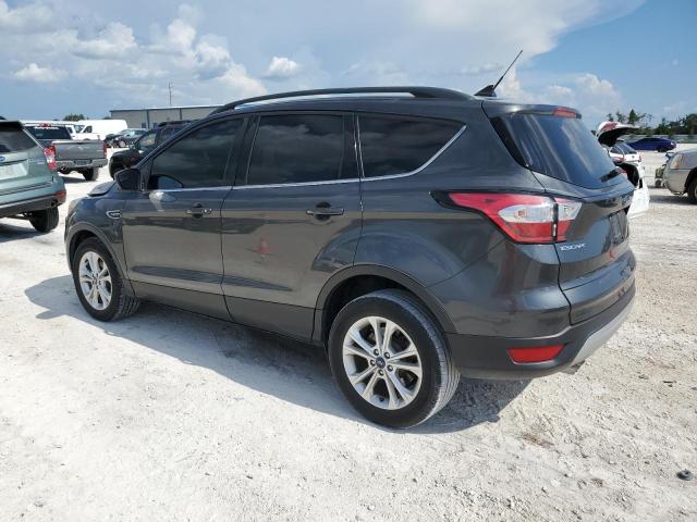 Photo 2 from auction – 2018 FORD ESCAPE SE with VIN 1FMCU0GD0JUC18097