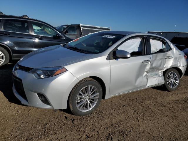 TOYOTA COROLLA L 2014 with VIN 5YFBURHE7EP173898 - Photo from auction