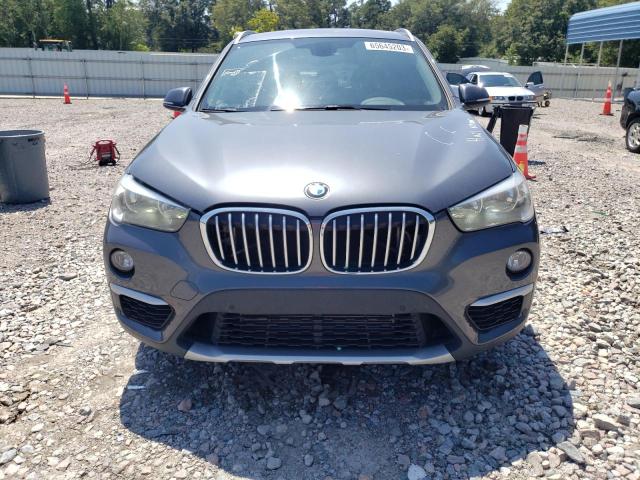 Photo 5 from auction – 2016 BMW X1 XDRIVE2 with VIN WBXHT3C35G5F63632