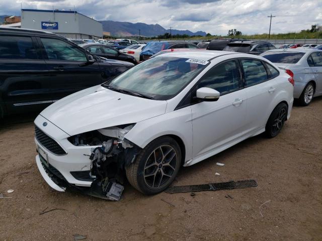 FORD FOCUS SE 2016 with VIN 1FADP3F2XGL216184 - Photo from auction
