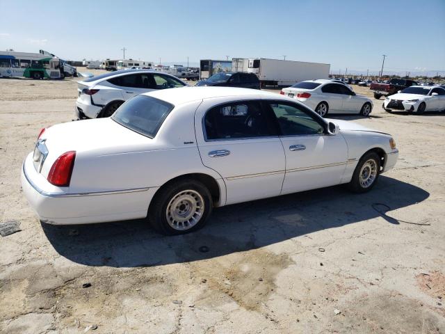 Photo 3 from auction – 2000 LINCOLN TOWN CAR E with VIN 1LNHM81W1YY858126