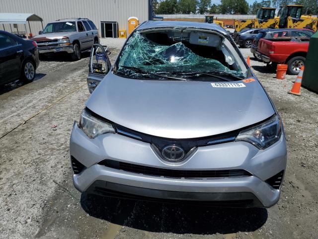 Photo 5 from auction – 2018 TOYOTA RAV4 LE with VIN 2T3ZFREV0JW411474