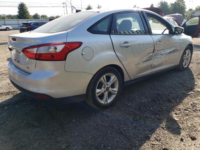 Снимка 3 от търг – 2014 FORD FOCUS SE с VIN 1FADP3F26EL409378