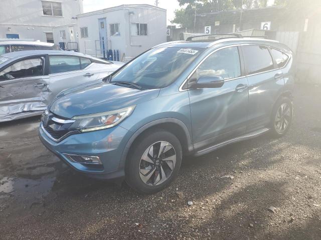 HONDA CR-V TOURI 2016 with VIN 5J6RM3H94GL005270 - Photo from auction