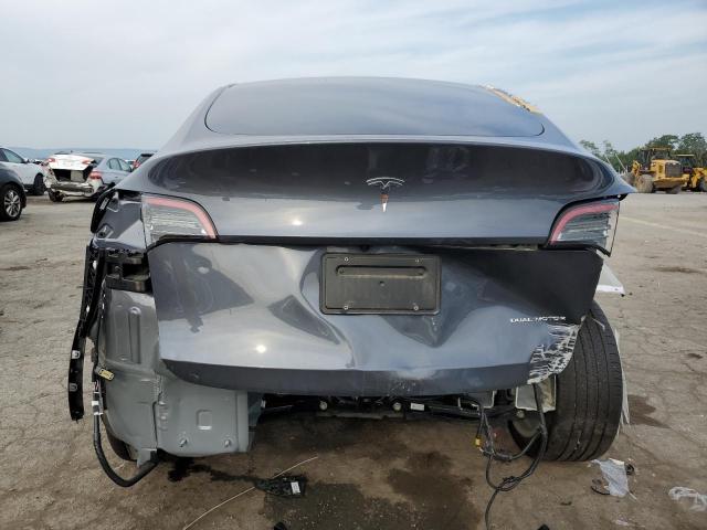 Снимка 6 от търг – 2022 TESLA MODEL Y с VIN 7SAYGDEE4NA021274