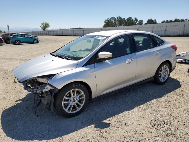 FORD FOCUS SE 2016 with VIN 1FADP3F29GL283097 - Photo from auction