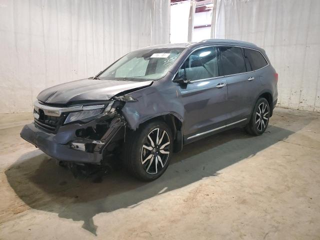 HONDA PILOT ELIT 2021 with VIN 5FNYF6H04MB059570 - Photo from auction