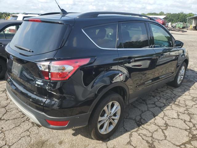 Photo 3 from auction – 2018 FORD ESCAPE SE with VIN 1FMCU9GD8JUB34677