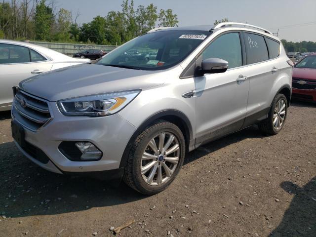 FORD ESCAPE TIT 2017 with VIN 1FMCU0J90HUA37080 - Photo from auction