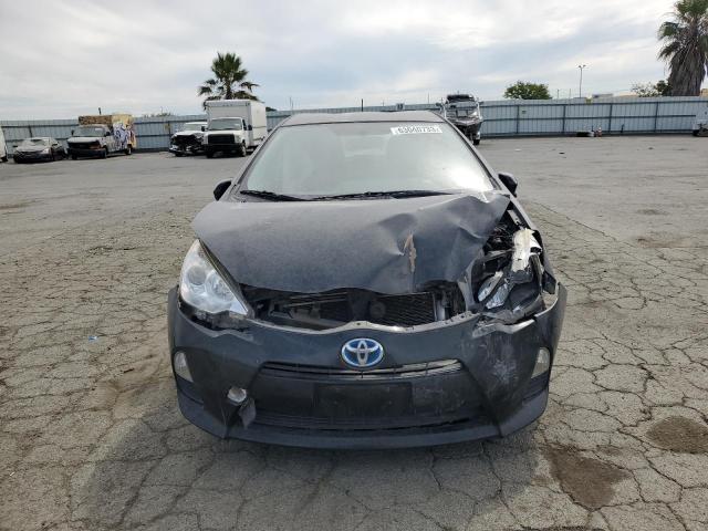 Photo 5 from auction – 2014 TOYOTA PRIUS C with VIN JTDKDTB37E1074720
