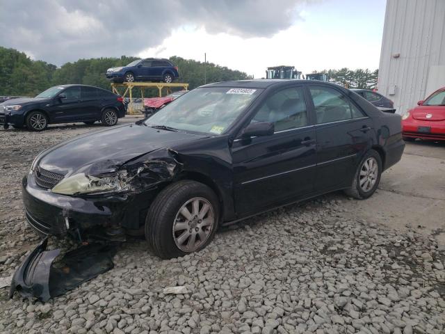 TOYOTA CAMRY LE 2002 with VIN 4T1BE30K92U094593 - Photo from auction