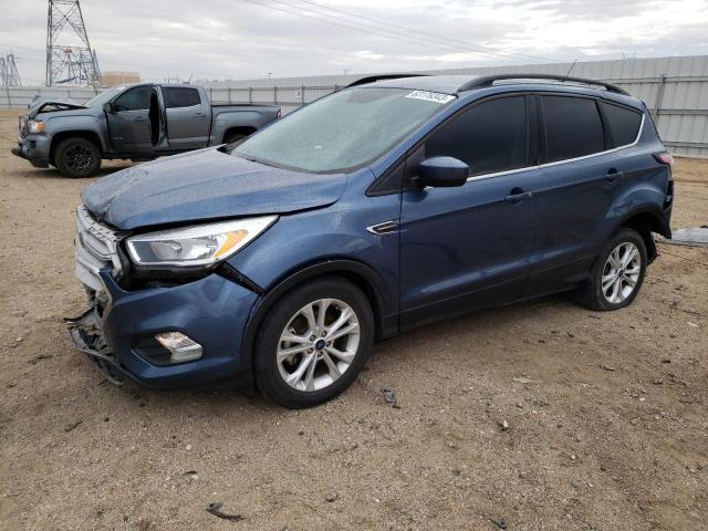 FORD ESCAPE SE 2018 with VIN 1FMCU0GD3JUC19485 - Photo from auction