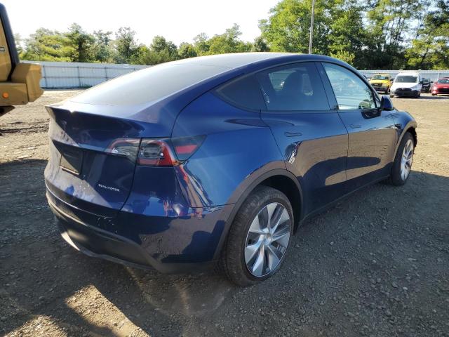 Photo 3 from auction – 2023 TESLA MODEL Y with VIN 7SAYGDEE1PA099417