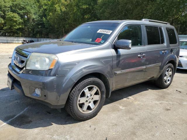 HONDA PILOT 2011 with VIN 5FNYF3H92BB040736 - Photo from auction