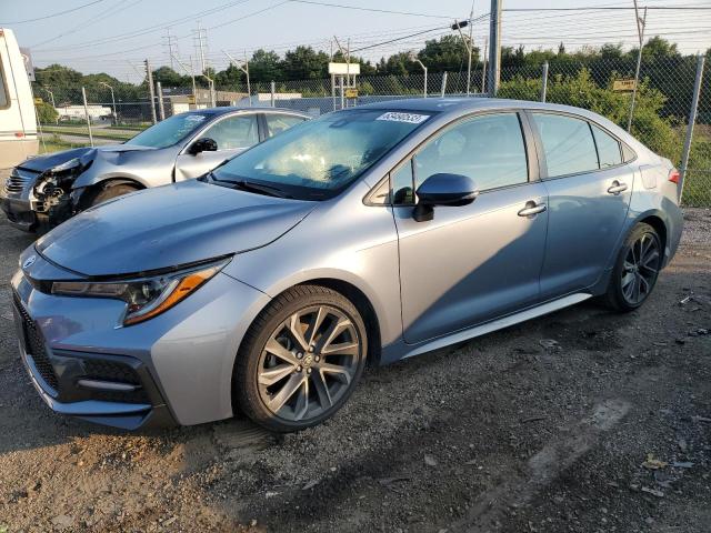 TOYOTA COROLLA SE 2021 with VIN 5YFS4MCE9MP087291 - Photo from auction