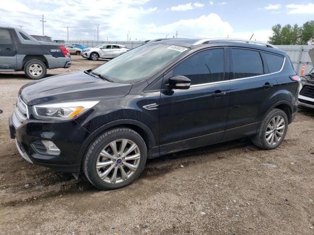 FORD ESCAPE TIT 2018 with VIN 1FMCU9J96JUA71664 - Photo from auction