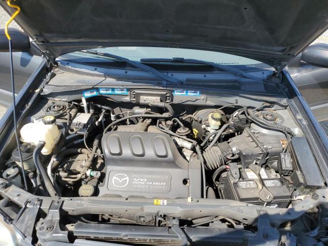 Photo 12 from auction – 2002 MAZDA TRIBUTE LX with VIN 4F2YU09112KM28699