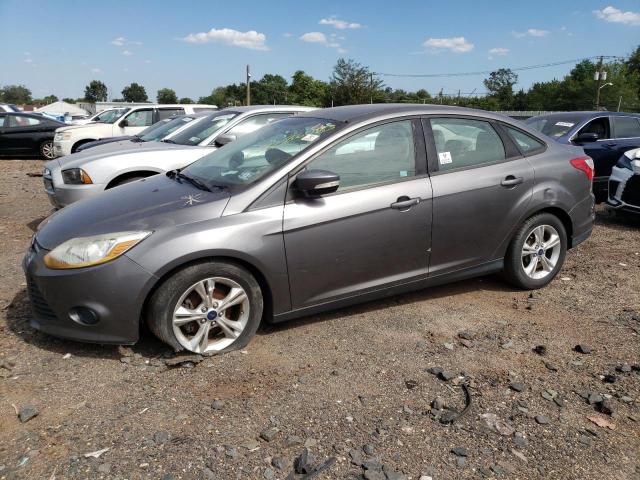 FORD FOCUS SE 2014 with VIN 1FADP3F21EL279428 - Photo from auction