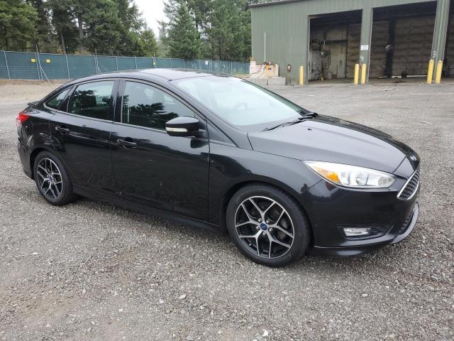 Photo 4 from auction – 2015 FORD FOCUS SE with VIN 1FADP3F20FL261911