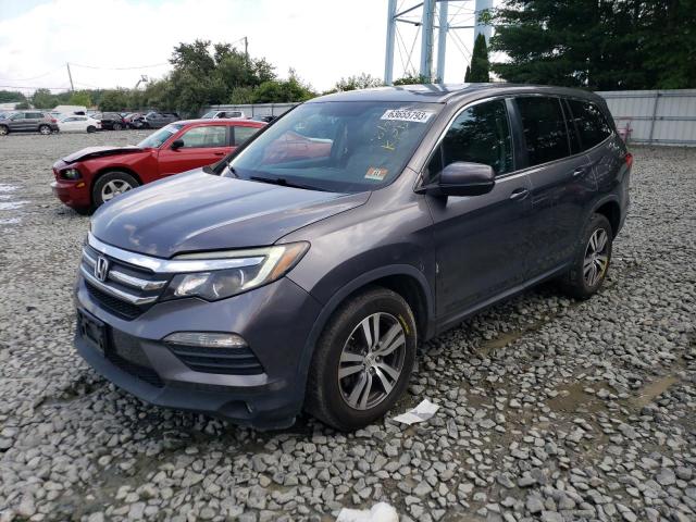 HONDA PILOT EXL 2016 with VIN 5FNYF6H50GB035623 - Photo from auction