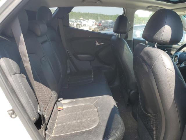 Photo 11 from auction – 2012 HYUNDAI TUCSON GLS with VIN KM8JUCAC4CU505373