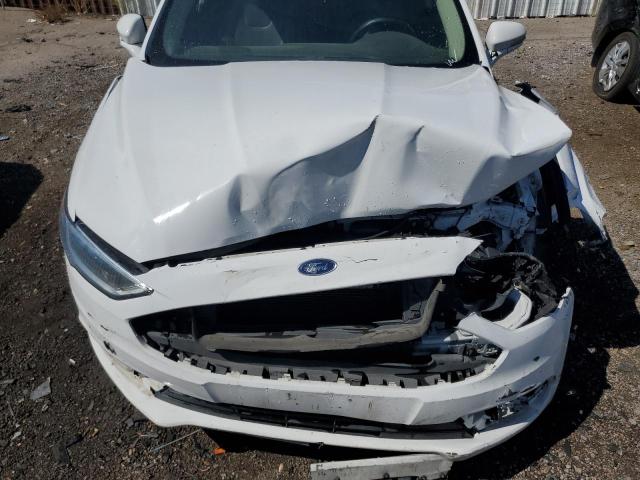 Photo 11 from auction – 2018 FORD FUSION TIT with VIN 3FA6P0D99JR132518