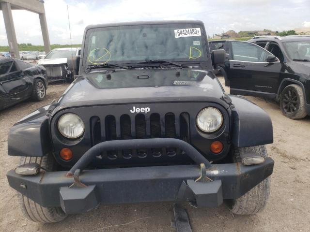 Photo 5 from auction – 2011 JEEP WRANGLER U with VIN 1J4HA5H14BL509353