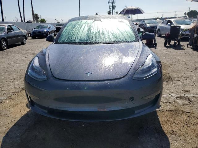 Photo 5 from auction – 2023 TESLA MODEL 3 AW with VIN 5YJ3E1EA4PF565949