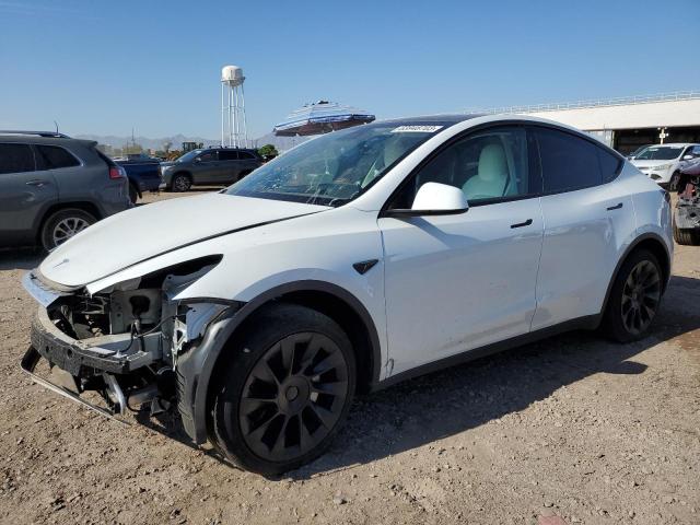 Снимка 1 от търг – 2023 TESLA MODEL Y с VIN 7SAYGAEE8PF591895