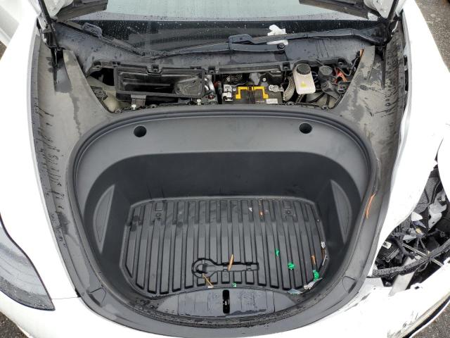 Снимка 11 от търг – 2021 TESLA MODEL 3 с VIN 5YJ3E1EA2MF997614