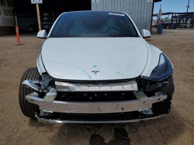 Photo 5 from auction – 2022 TESLA MODEL Y with VIN 7SAYGAEE8NF553872