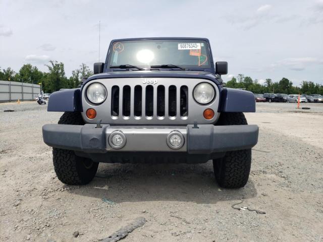 Photo 5 from auction – 2012 JEEP WRANGLER U with VIN 1C4BJWDG3CL290124