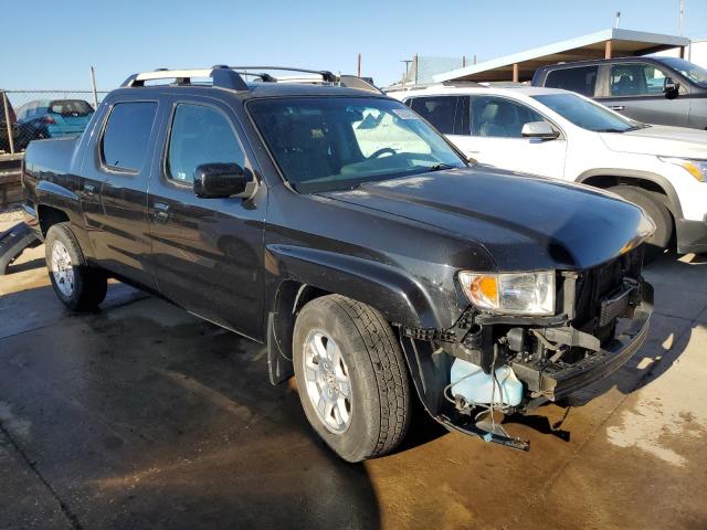 Photo 4 from auction – 2011 HONDA RIDGELINE with VIN 5FPYK1F41BB006818