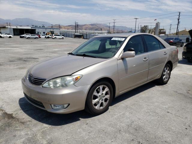 TOYOTA CAMRY LE 2005 with VIN 4T1BF30K55U604634 - Photo from auction